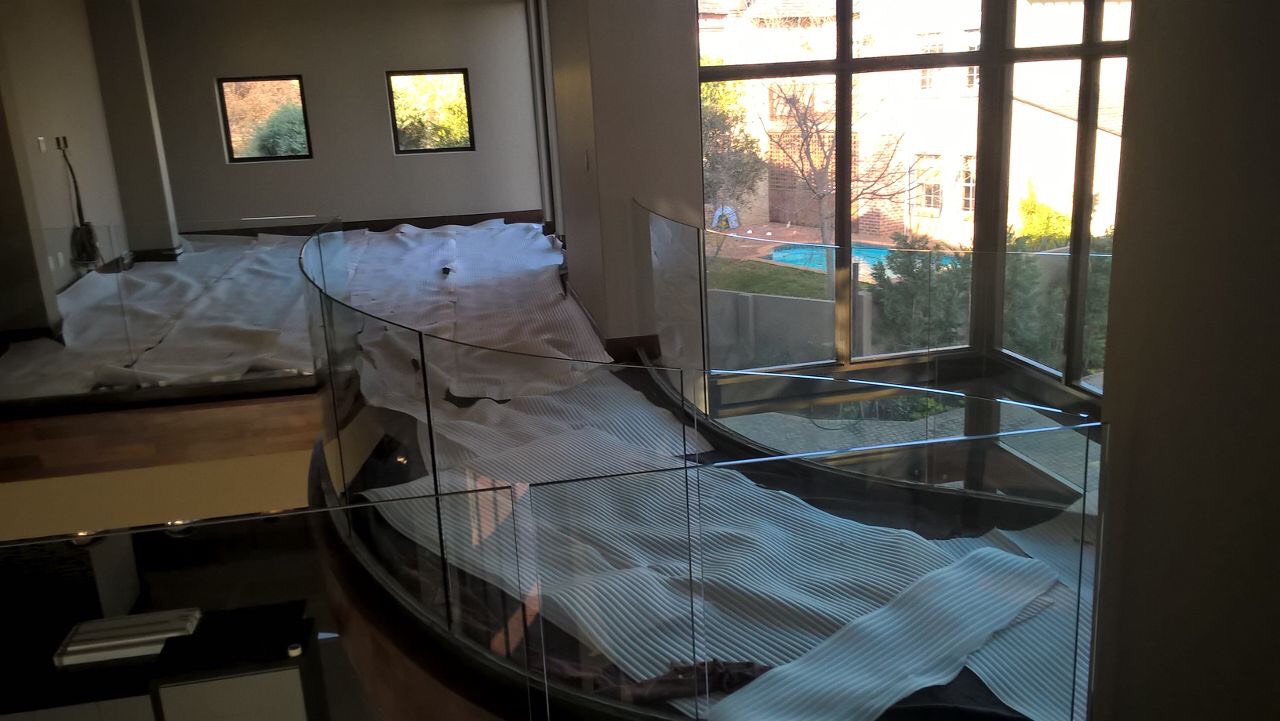 Folding-stacking aluminium doors installed and opened onto a patio